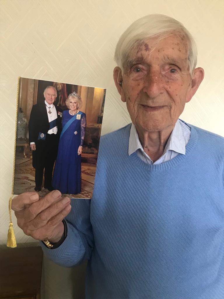 War veteran celebrates 100th birthday - and he still enjoys 'long walks'