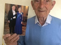 War veteran celebrates 100th birthday - and he still enjoys 'long walks'