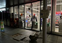 Car crashes into front window of Isle of Man Co-Op store