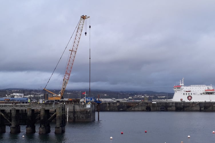 200-tonne crawler crane at the end of King Edward VII Pier
