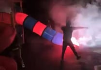 Second video shows teens shooting fireworks down slide at playground