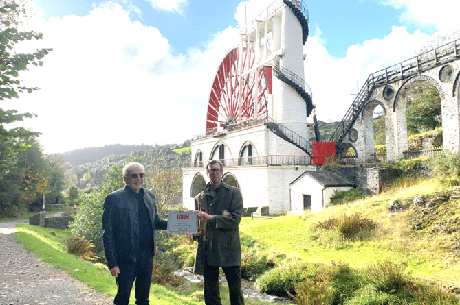 John-Paul Walker (right) accepts Institute of Historic Building Conservation North West Conservation Award, for conservation of the Great Laxey Wheel from Architect Ashley Petit representing the Institute of Historic Building Conservation.