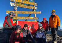 The 'emotional moment' walkers flew the Manx flag flown on summit of Kilimanjaro