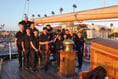 Theatre group stun Americans with belting musical rendition on ship