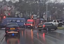 Video appears to show minibus lose control before crashing into car