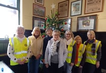 Christmas celebrated by two island community clubs