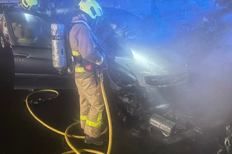 The fire service dealing with a car fire in Onchan on Tuesday night