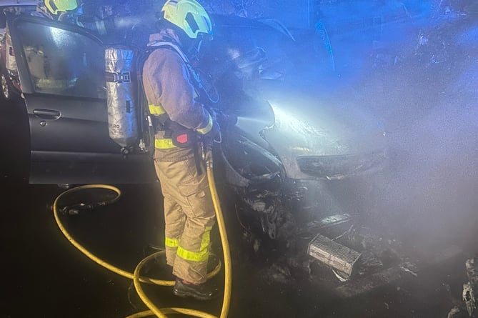 The fire service dealing with a car fire in Onchan on Tuesday night