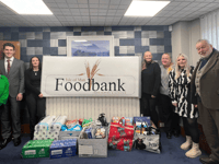 Legal firm donates to food bank ahead of Christmas