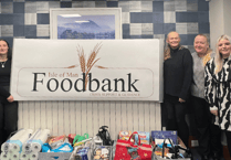 Legal firm donates to food bank ahead of Christmas