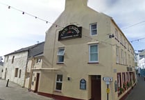 Fight spilled outside pub after man 'tried to separate hugging duo'