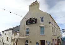 Man denies breaching dog control order after pub incident