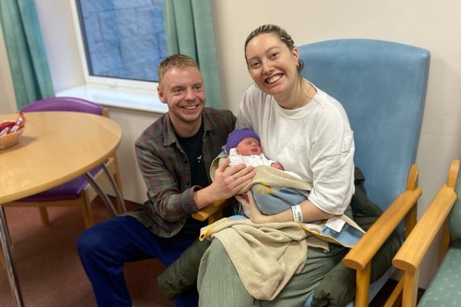 Baby Roma with parents Jasmine and Jack Taylor