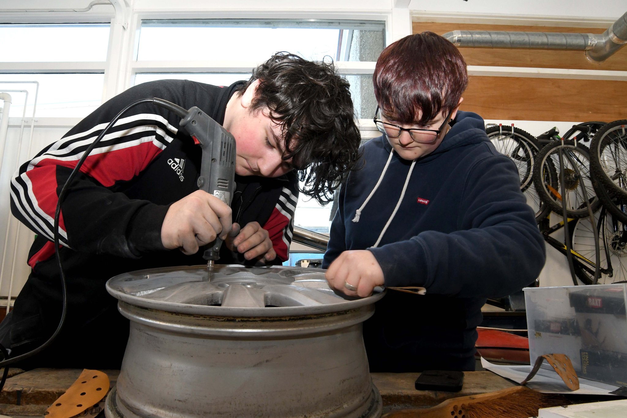 Pupils maintain cars as part of lessons ahead of entering the world of work