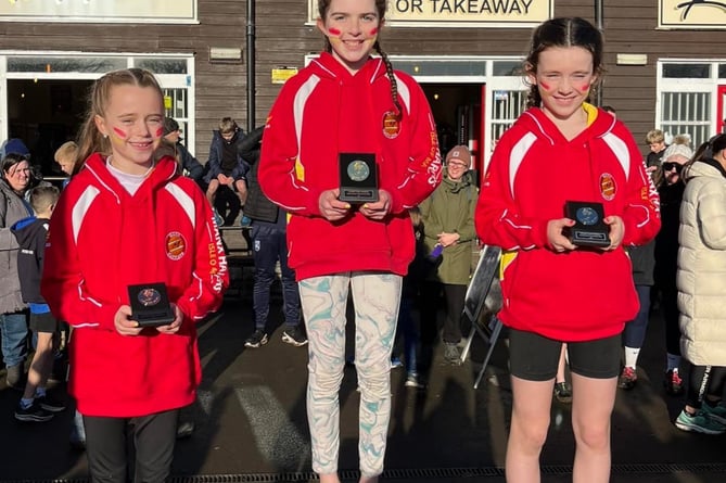 The Manx Harriers under-11 girls team of (left to right) Mollie McMullan (bronze), Eve Martin (gold) and Bella Quaye (silver)