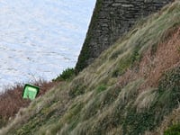 Isle of Man cleanup group furious as bin tossed onto cliff edge