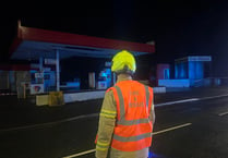 Parts of petrol station’s roof torn off as fire service issues warning