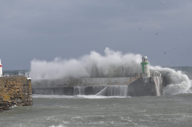 Waves breaking over Laxey Harbour during Storm Emma 