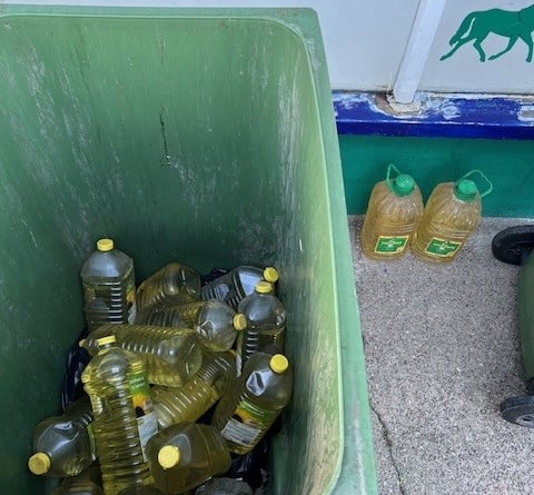 Used cooking oil in residential bins on Shore Road.