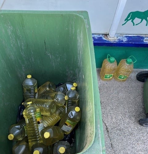 Used cooking oil in residential bins on Shore Road.