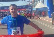 Runner flies Manx flag in Africa after finishing first marathon
