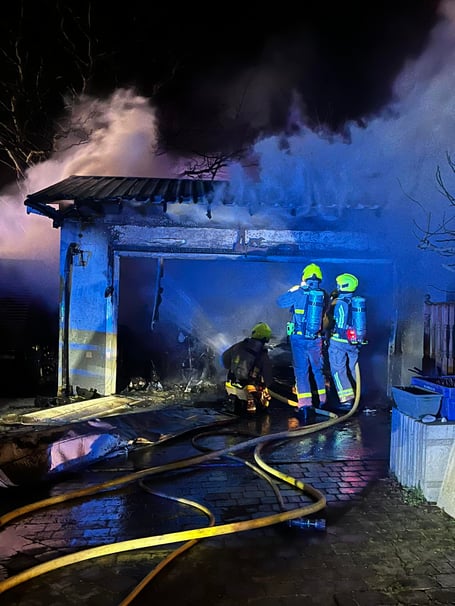 Fire crews at the scene of the garage blaze