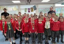 Isle of Man swimming stars give inspirational talk to school class