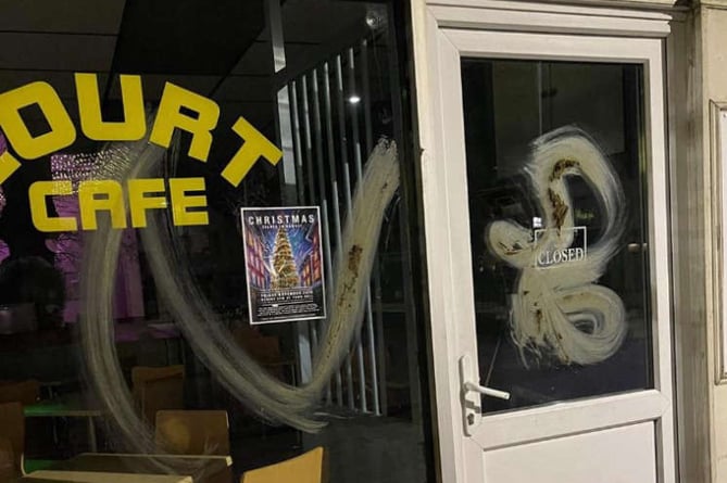 Feces smeared on the window of the Court Cafe in Douglas 