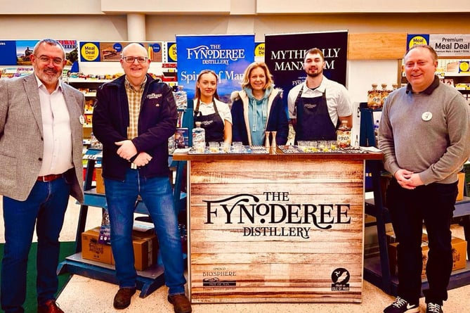 Staff from the Fynoderee Distillery with members of the Tesco team at the Lake Road store in Douglas 