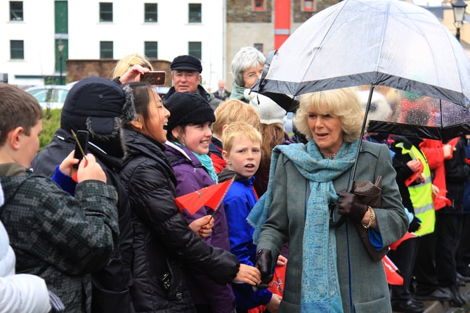 Camilla greets schoolchildren during a visit to the Isle of Man back in 2012