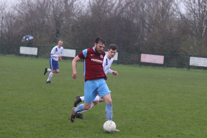 Union Mills hat-trick hero Luke Booth in action against Douglas Royal