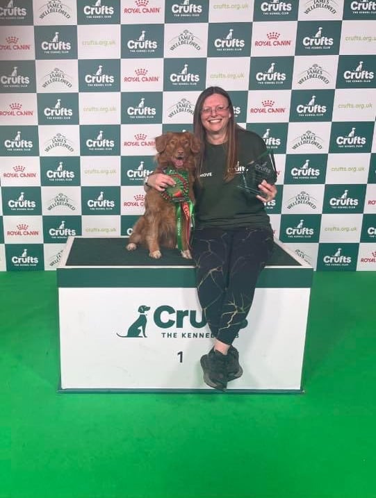 Janine Coleman with her dog Ella after winning the intermediate ABC (anything but collie) agility competition at Crufts 2024