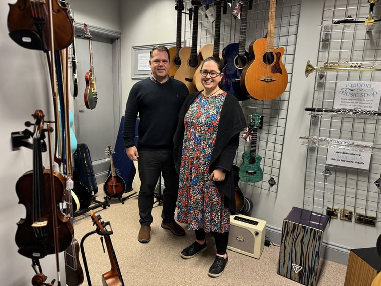 Managing director of the Auxesia Group Stuart Colligon with Heather Daykin at the Mannin Music Shop in Peel