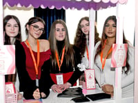 Pictures show students competing in top business contest