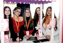 Pictures show students competing in top business contest