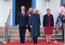 Watch as fans give Queen Camilla a Royal round of applause at Government House