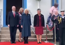 Watch as fans give the Queen a round of applause at Government House