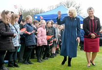 Queen Camilla tells crowds King Charles is 'on the mend'
