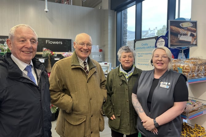 Chair of Marown Commissioners Terry Miles, Lieutenant Governor Sir John Lorimer, Lady Lorimer and manager of Crosby Co-Op Stefanie Faragher 