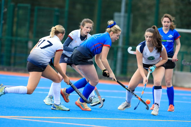 Valkyrs A's Jess Loader under pressure from the Bacchas A trio of Sophie Bowers, Isabella Craig and Rosie Callow during Saturday's clash at the NSC