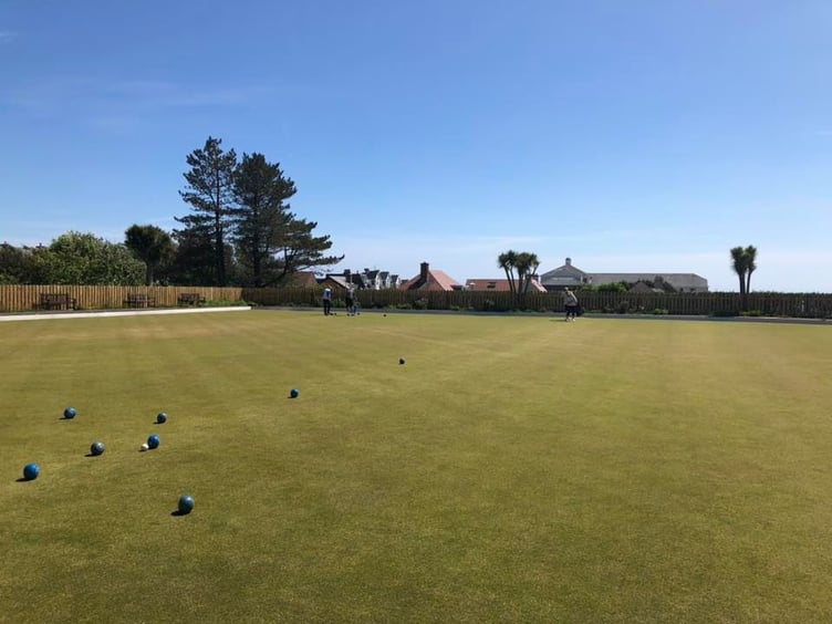 The flat lawn bowls green in Onchan Park