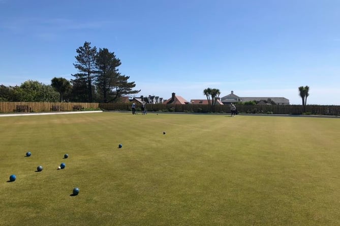 The flat lawn bowls green in Onchan Park