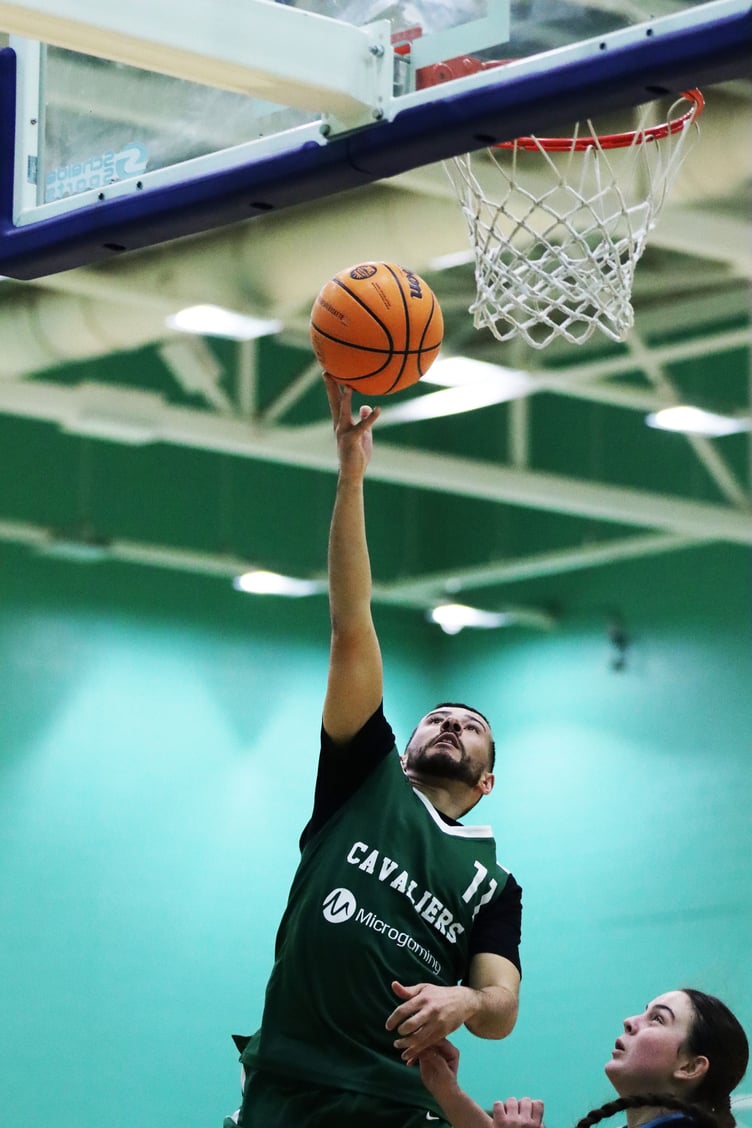 Mike Lewis goes to the basket for a lay-up. A returning Lewis helped Cavaliers in their play-off victory over the Hoops (Photo: Oliver Hamilton)