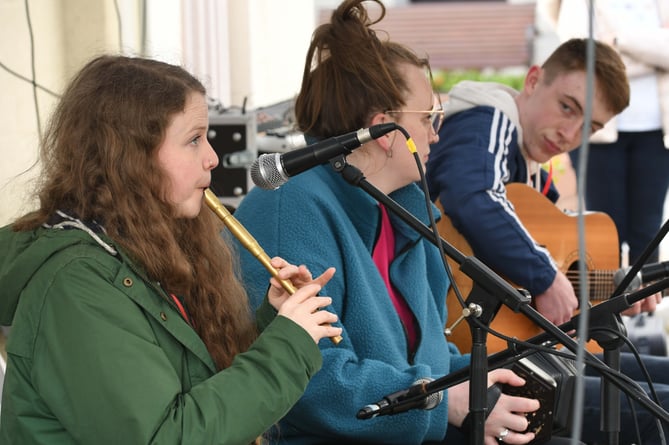 Pictured are musicians Beccy Hurst, Greta Curtin and Finley Bray from the Isle of Man, Ireland and Cornwall respectively performing at the Shennaghys Jiu festival in Ramsey.
