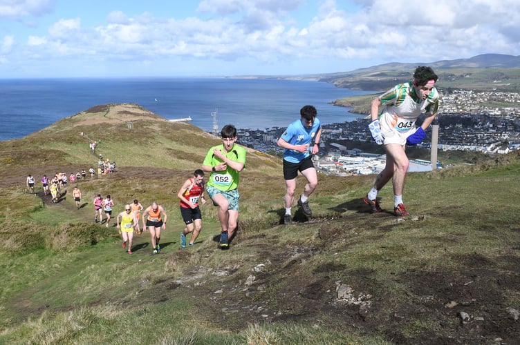 The early stages of the men's Peel Hill race in last weekend's Easter Festival of Running. Christopher Killey (No.172) was the leading local in 51st, five places ahead of fellow Manxman James Harrison (wearing blue top) in 56th (Photo: Dave Kneale)