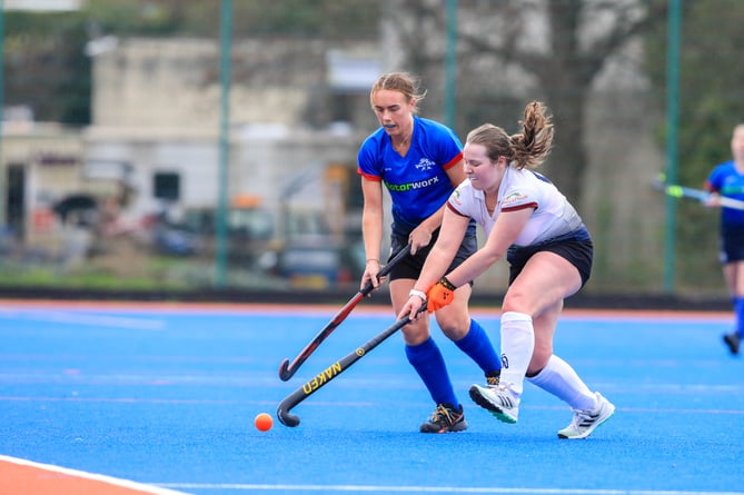 Bacchas A's Orla Goddard stretches for the ball against Valkyrs A's Eleanor Devereau during the two sides' recent Women's Premiership clash (Photo: Callum Staley)
