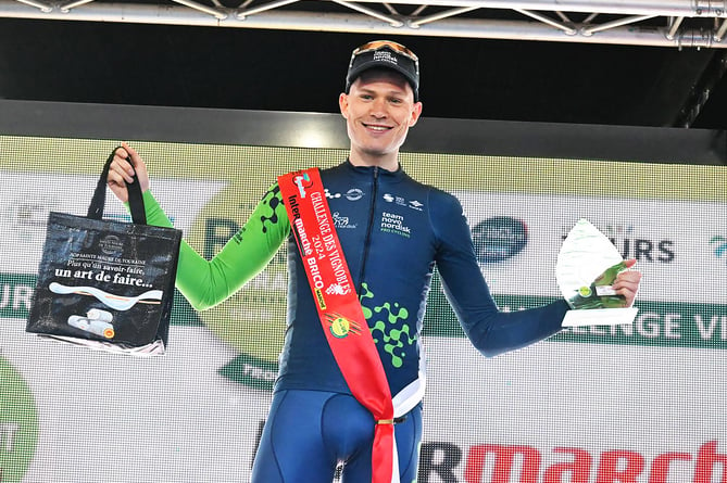 Sam Brand on the podium after winning the sprint competition in the La Roue Tourangelle in France