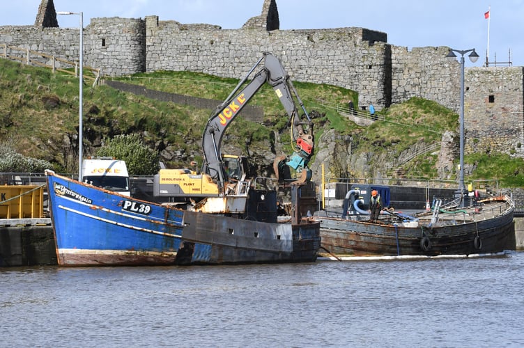 Dismantling operations on boats in Peel Marina - the Venture Again is being dismantled at the request of her owner 