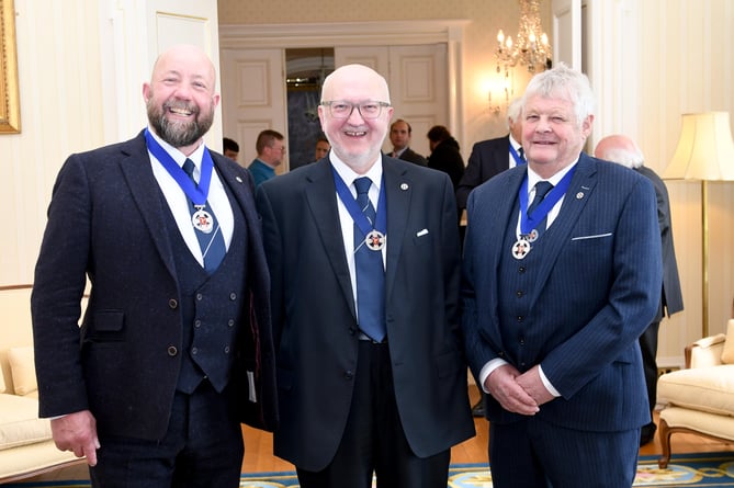 The swearing in of Dave Martin (centre) as Captain of the Parish of Andreas at Government House - pictured with recently appointed captains Paul Costain and Peter Quayle