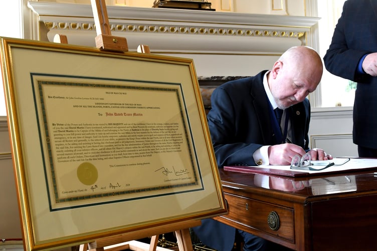 The swearing in of Dave Martin as Captain of the Parish of Andreas at Government House -